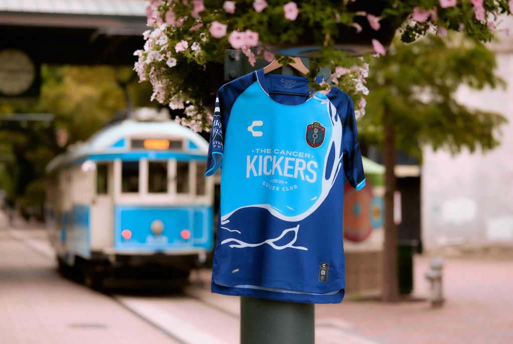 The 901 FC River Kit on Main St. in front of a trolley